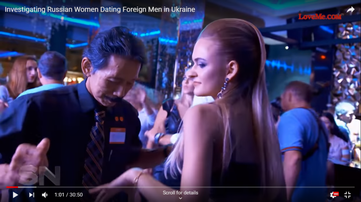 American or Western man dancing with Ukrainian woman at romance tour